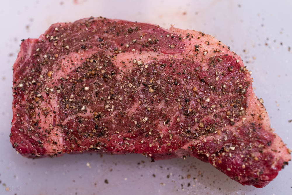 Seasoning the steak